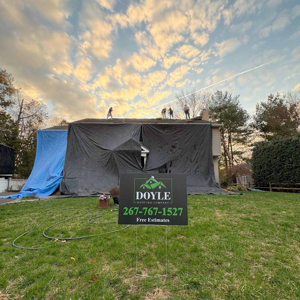 Roofing crew from Doyle Roofing Company LLC at work