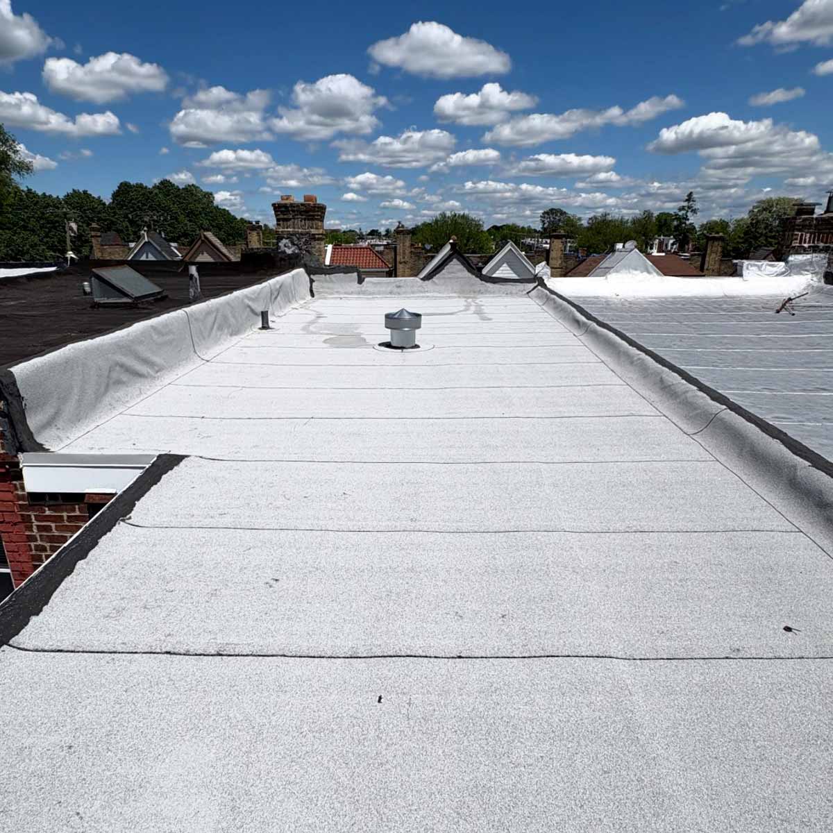 Flat roof newly installed by Doyle Roofing Company LLC