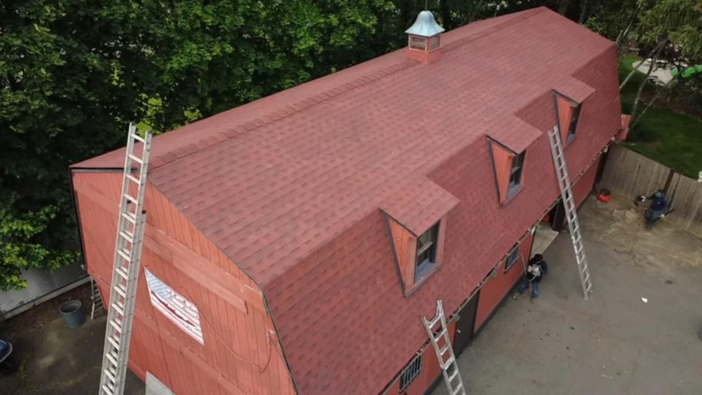 Newly installed red shingle roof